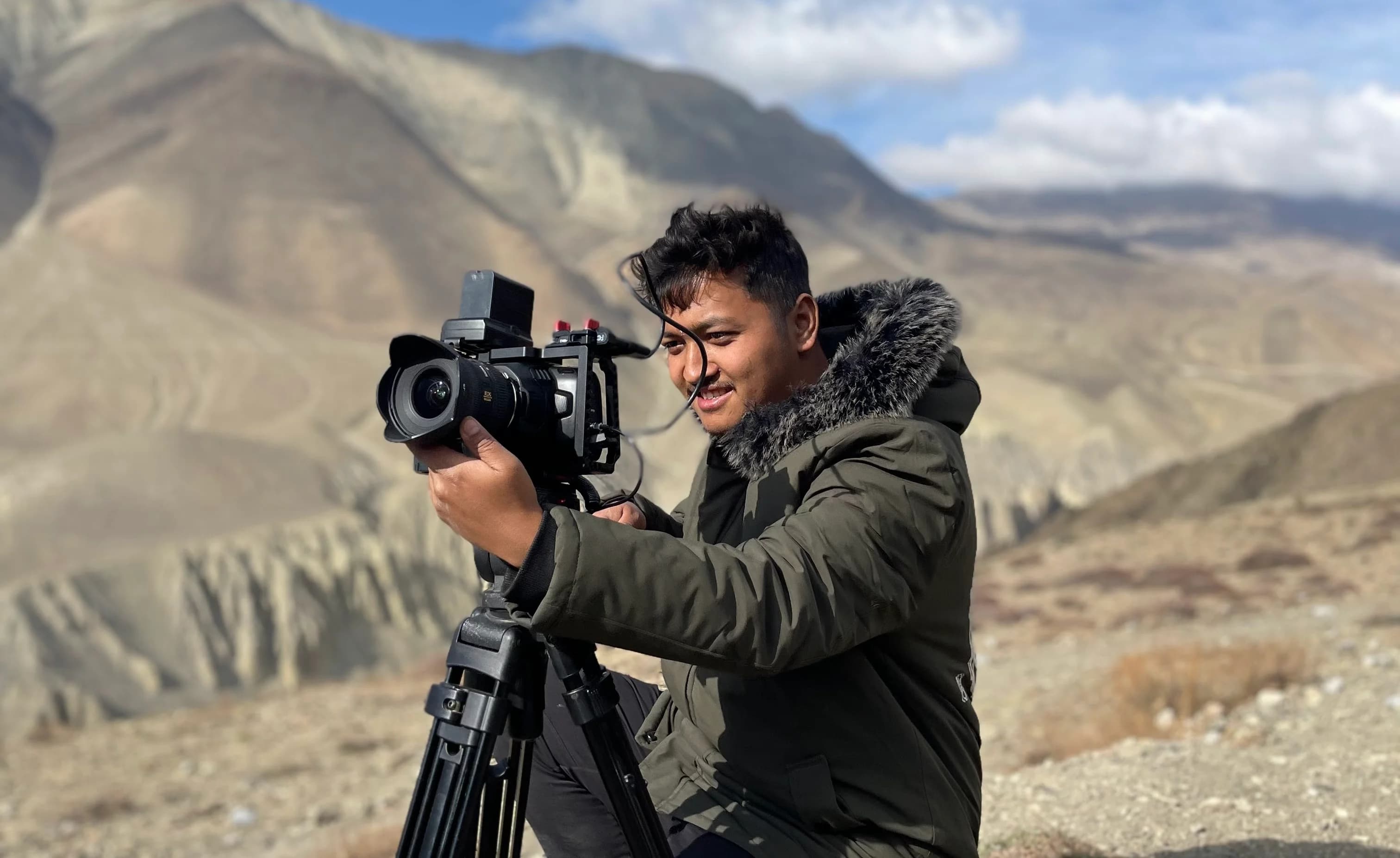 Cinematic photographer with golden bokeh